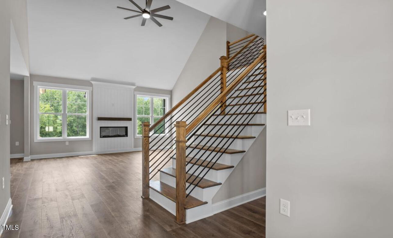 8 North Big Woods Road Spring Hope, NC 27882 - Photo 3 of 5 a view of an entryway with wooden floor and staircase