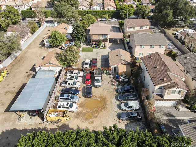 an aerial view of residential house with outdoor space