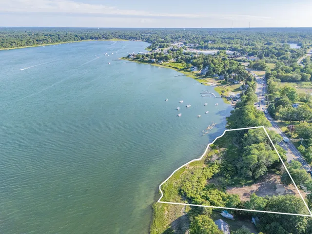 a view of a city from a lake view