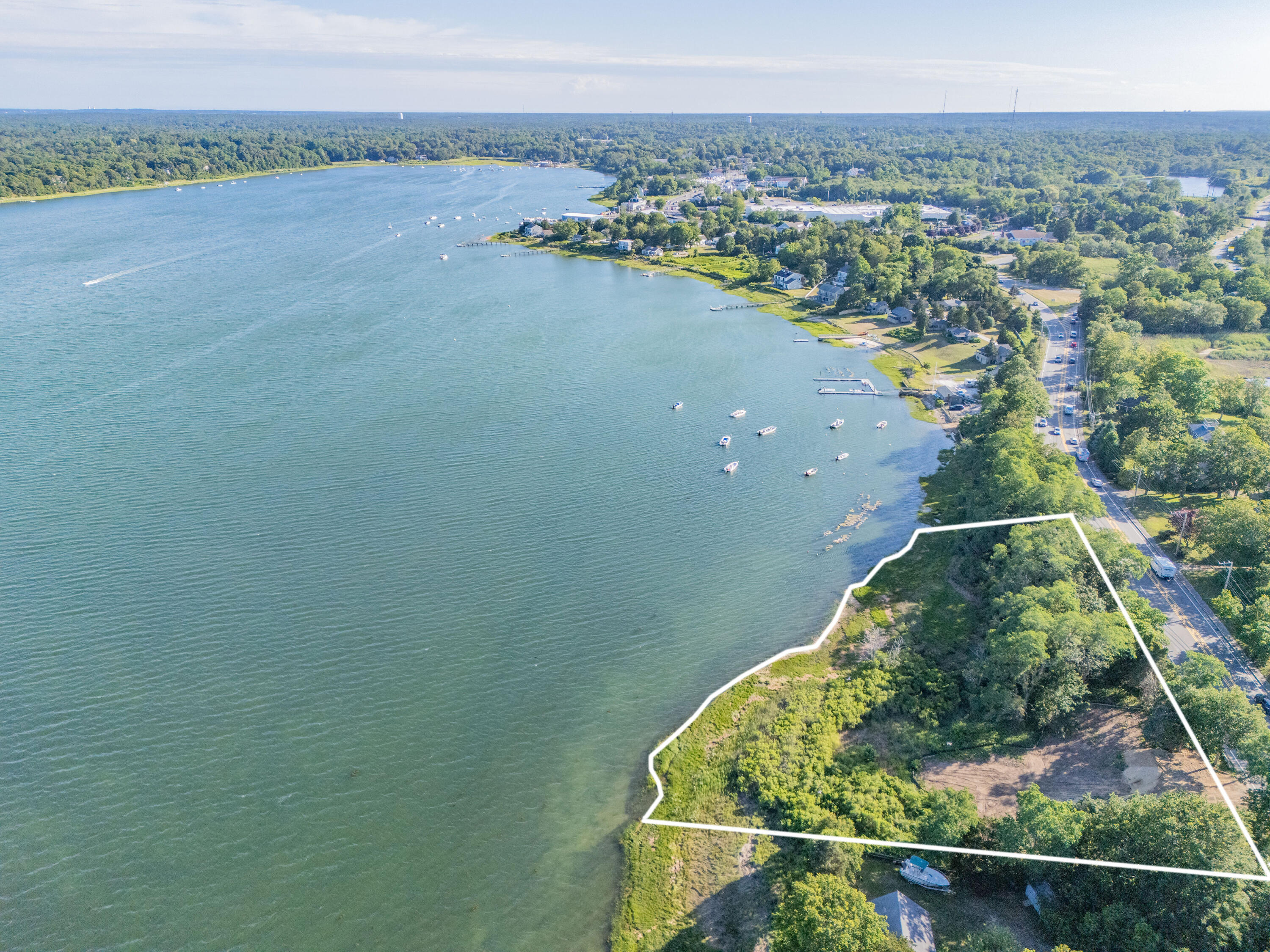 320 State Highway Eastham, MA 02642 - Photo 4 of 9 a view of a city from a lake view