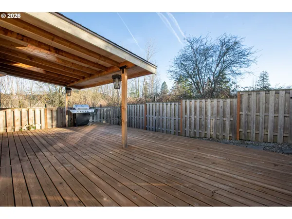 a view of backyard with wooden floor