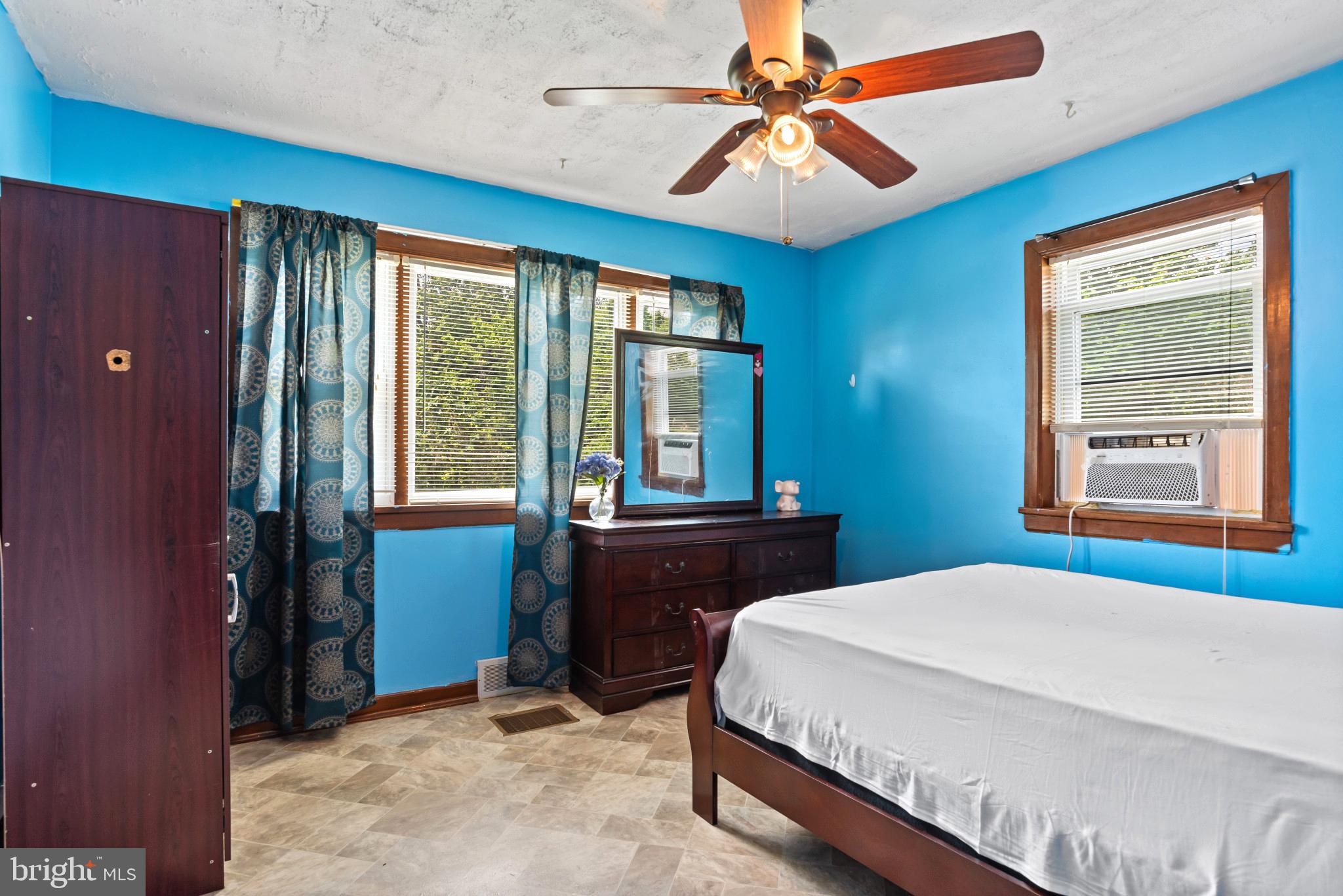 201 Village Road Harrisburg, PA 17112 - Photo 15 of 32 a bedroom with a bed and a window