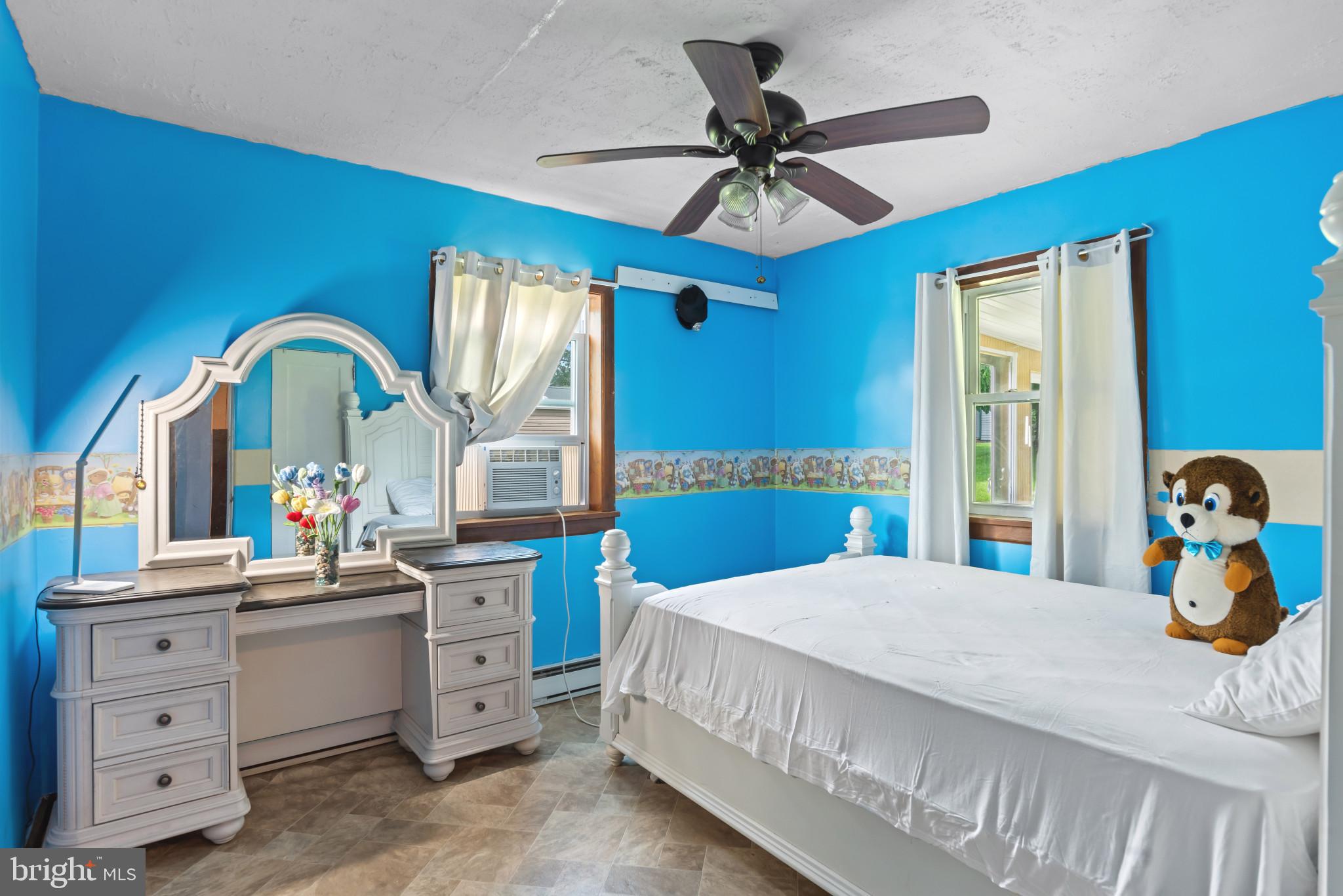 201 Village Road Harrisburg, PA 17112 - Photo 18 of 32 a bedroom with a bed and a dresser