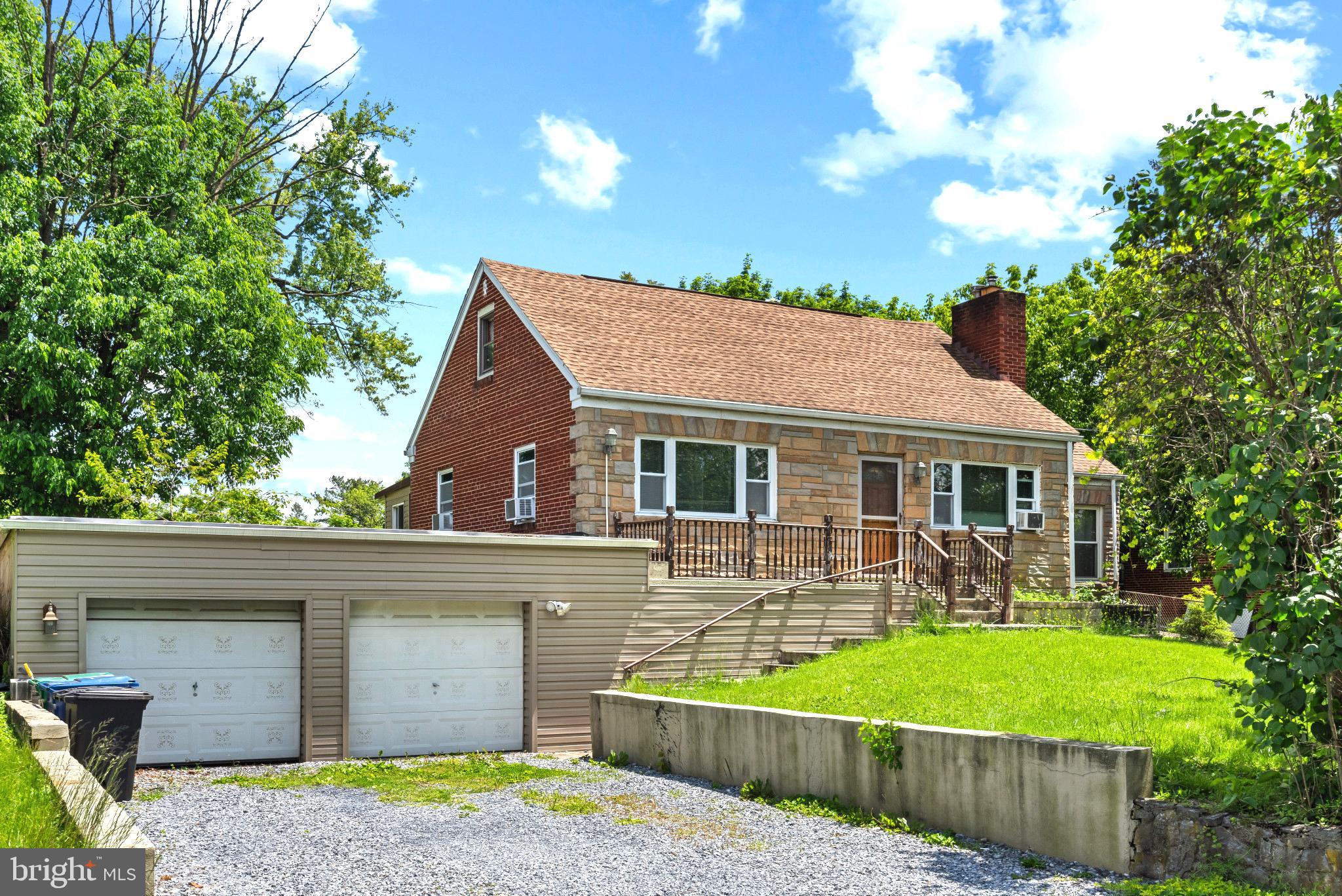 201 Village Road Harrisburg, PA 17112 - Photo 2 of 32 front view of house with a yard