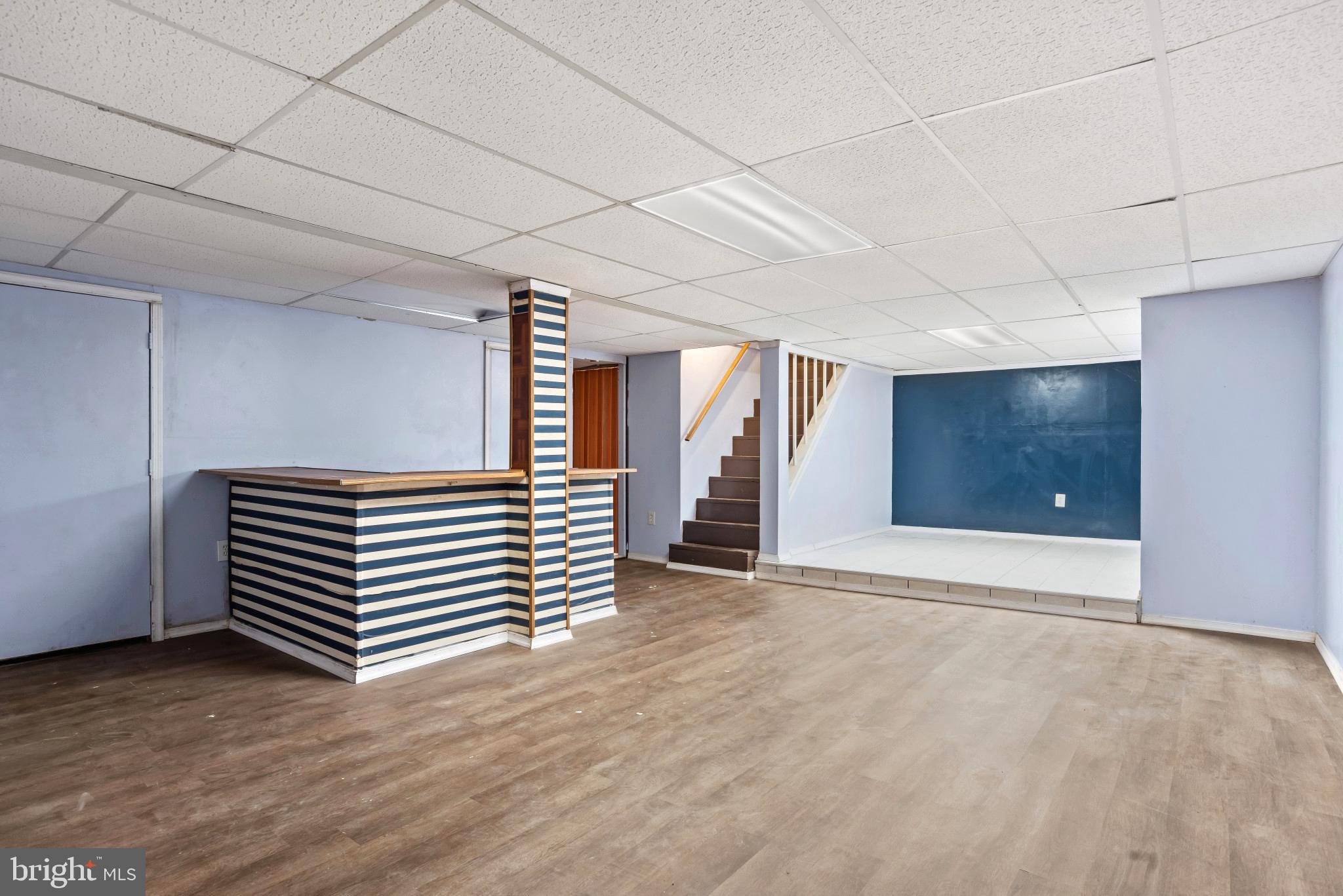 201 Village Road Harrisburg, PA 17112 - Photo 25 of 32 a view of a room with stairs and a window