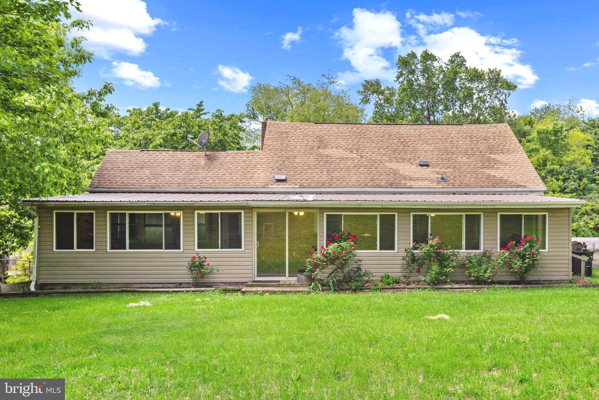 201 Village Road Harrisburg, PA 17112 - Photo 27 of 32 front view of a house with a yard
