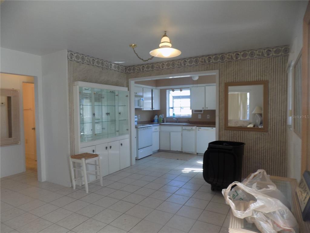 13250 4th Street East Madeira Beach, FL 33708 - Photo 9 of 29 View of the dining and kitchen area.