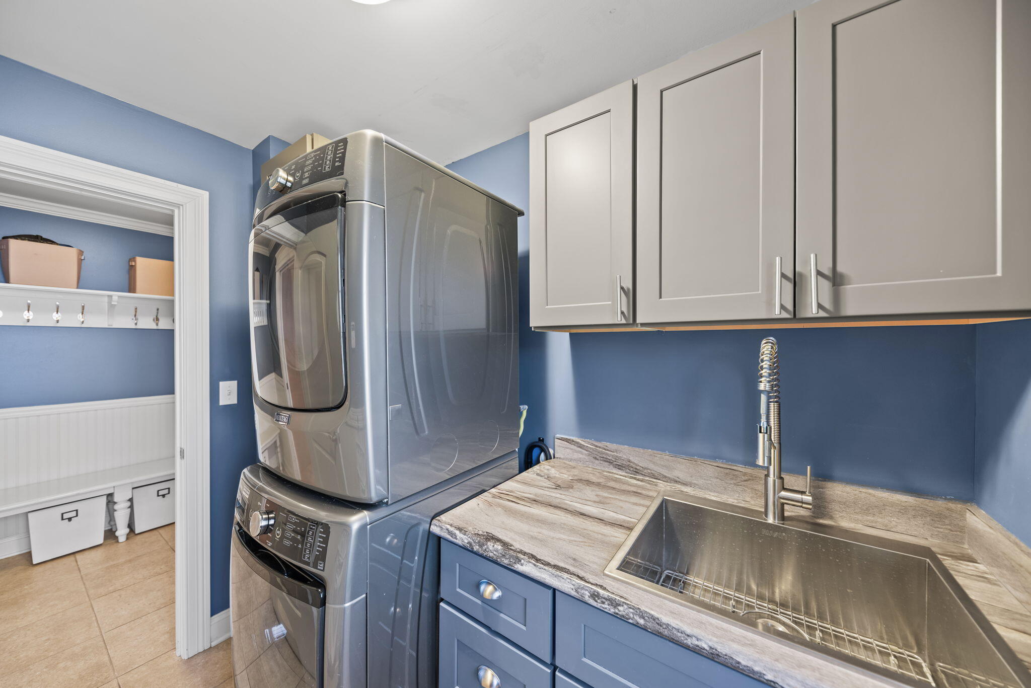 10135 S Branch St. John, IN 46373 - Photo 19 of 45 a kitchen with stainless steel appliances granite countertop a sink and a refrigerator