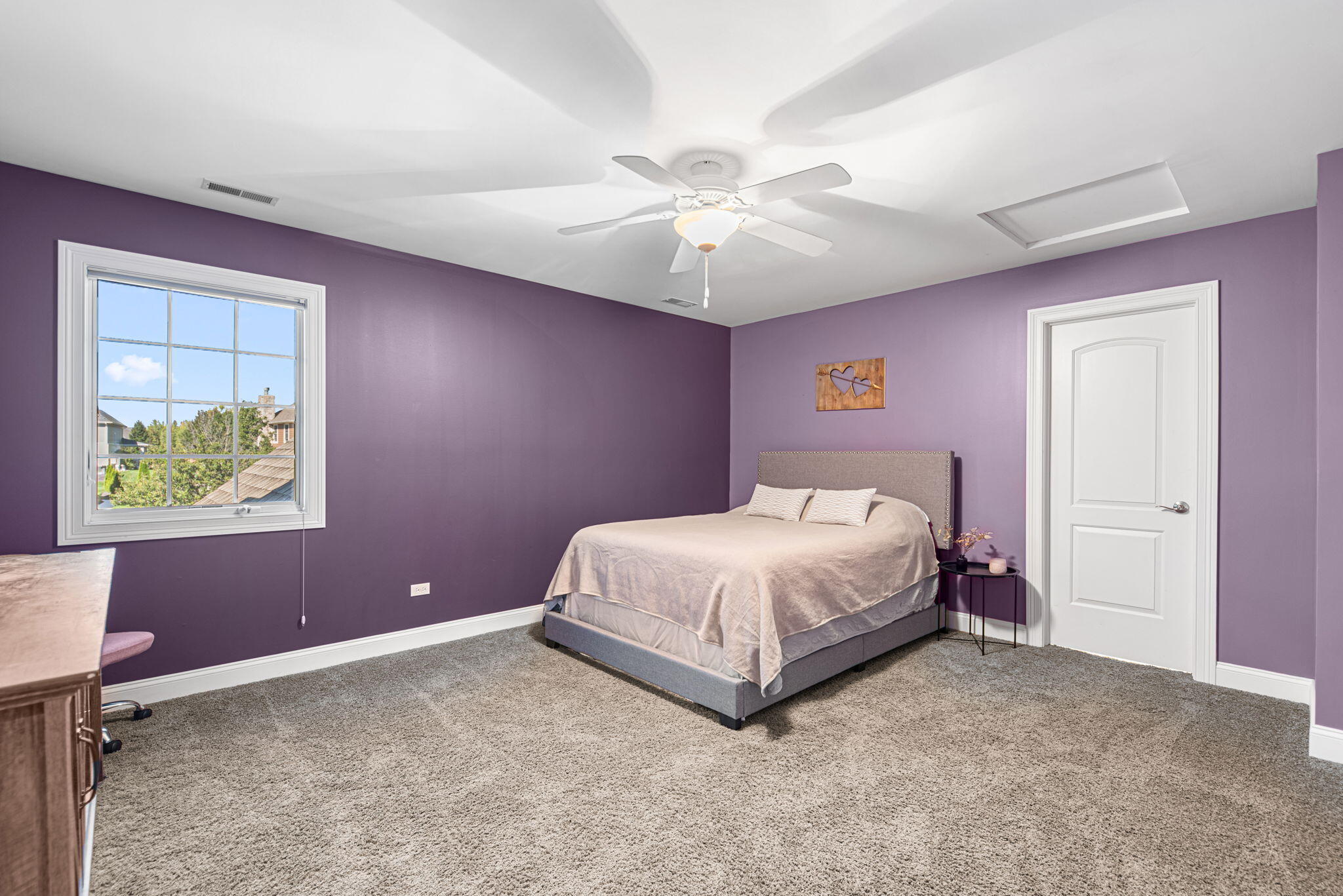 10135 S Branch St. John, IN 46373 - Photo 25 of 45 a spacious bedroom with a bed and a chandelier