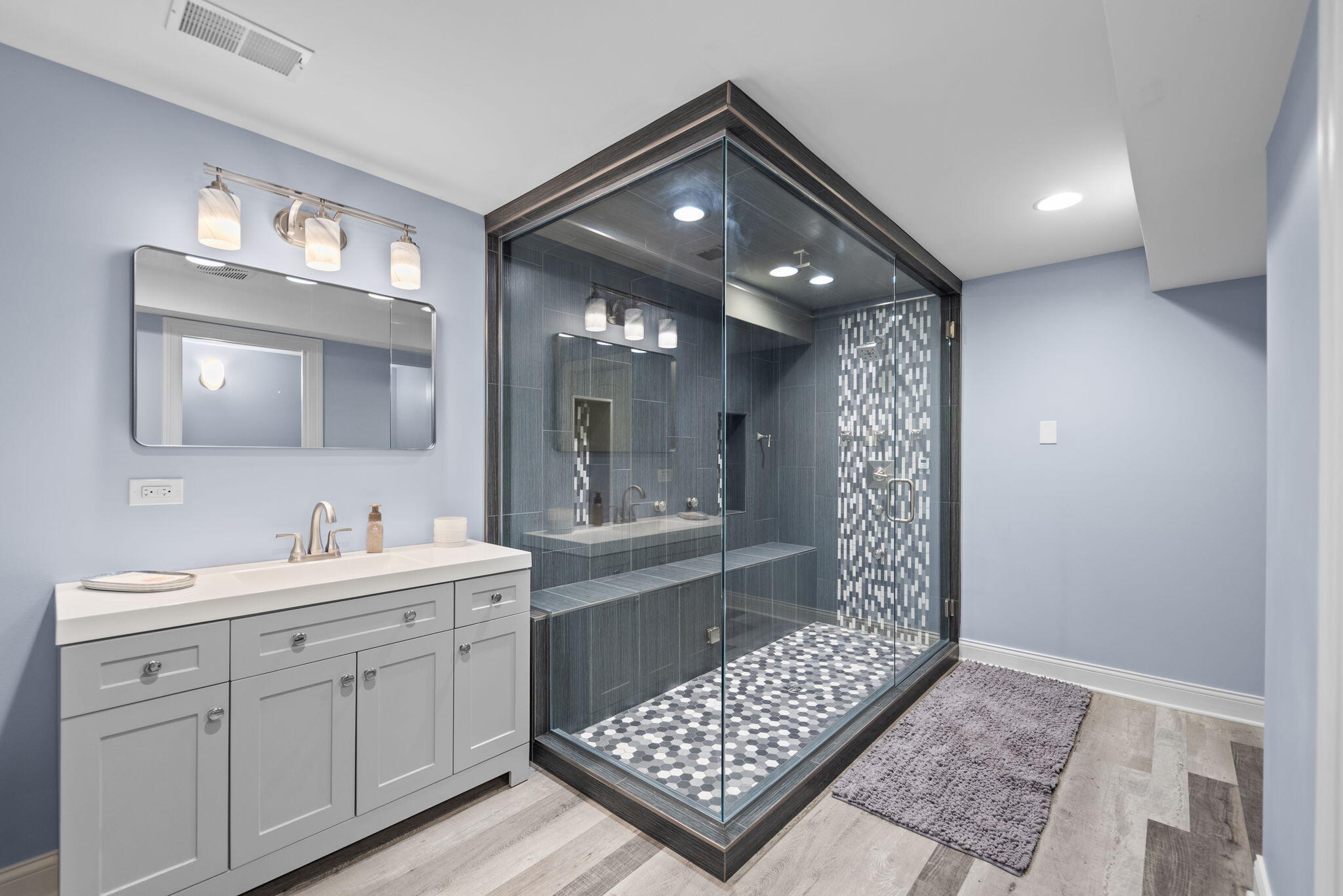 10135 S Branch St. John, IN 46373 - Photo 33 of 45 a bathroom with a sink a toilet and shower