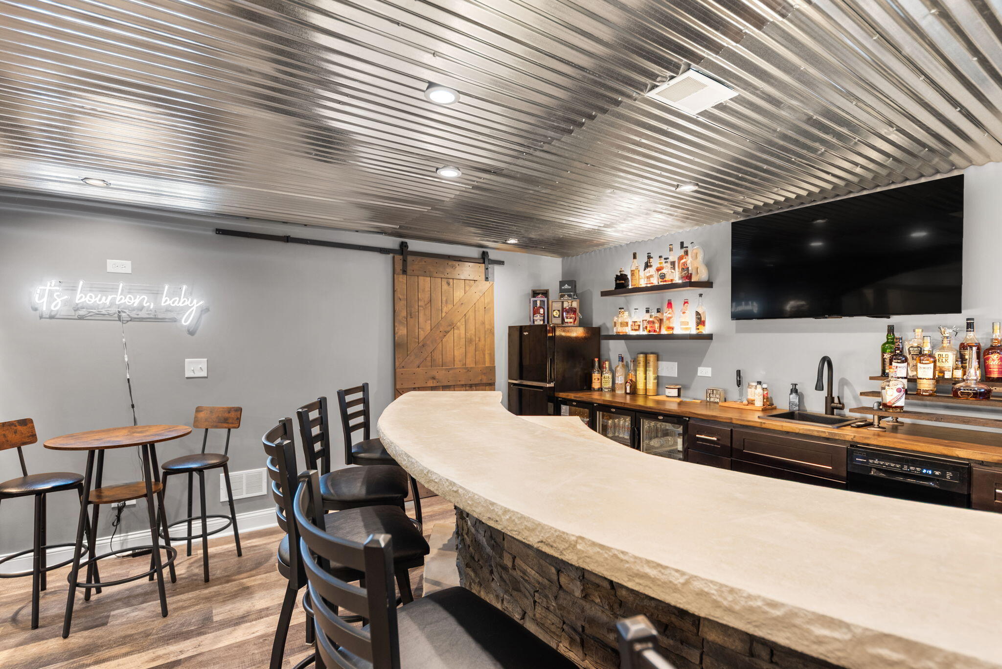 10135 S Branch St. John, IN 46373 - Photo 37 of 45 a kitchen with a table chairs refrigerator and a microwave