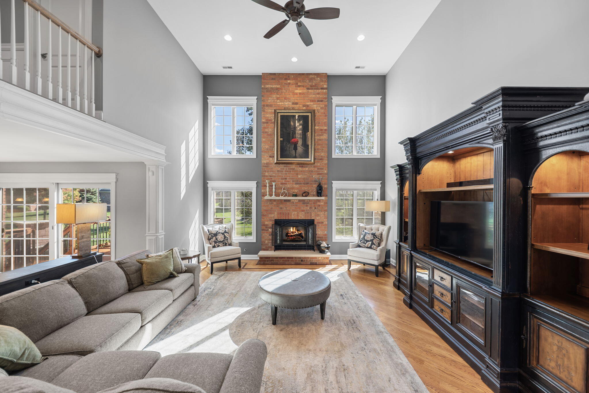 10135 S Branch St. John, IN 46373 - Photo 4 of 45 a living room with furniture fireplace and flat screen tv