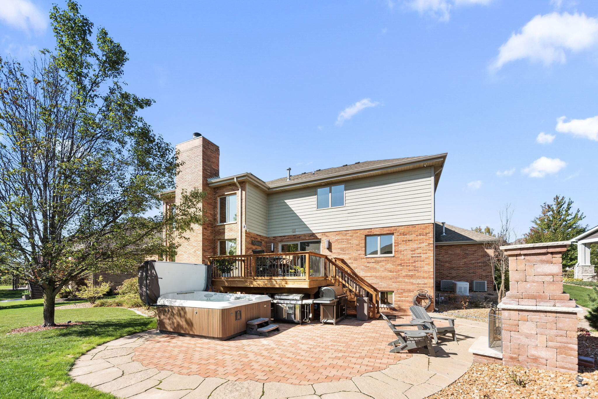 10135 S Branch St. John, IN 46373 - Photo 41 of 45 a front view of a house with outdoor seating