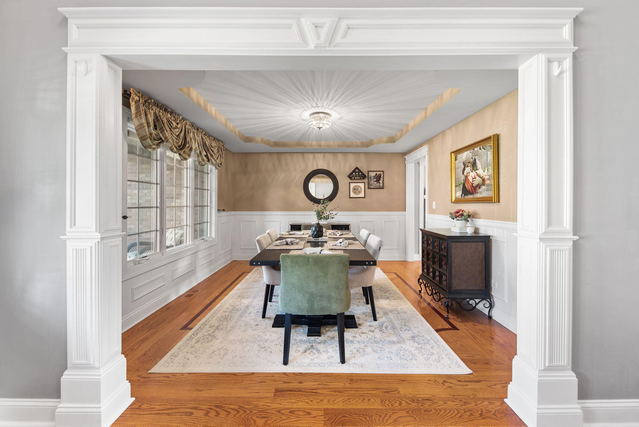 10135 S Branch St. John, IN 46373 - Photo 8 of 45 a living room with couch and a chandelier