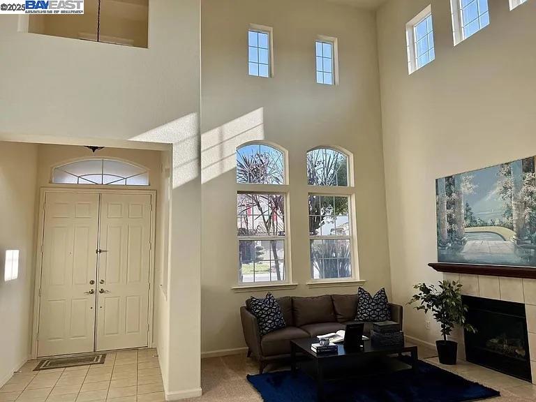 3017 Roslyn Drive Modesto, CA 95355 - Photo 3 of 30 a living room with furniture a fireplace and walls