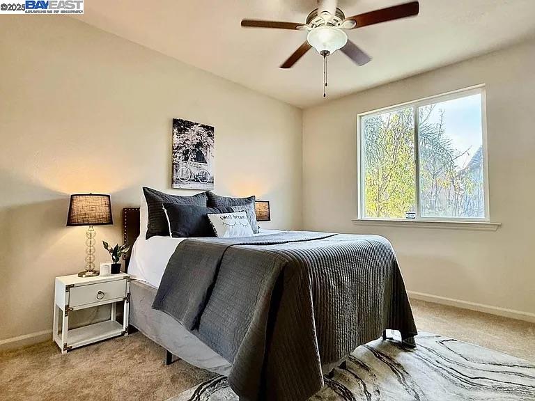 3017 Roslyn Drive Modesto, CA 95355 - Photo 8 of 30 a bedroom with bed and window