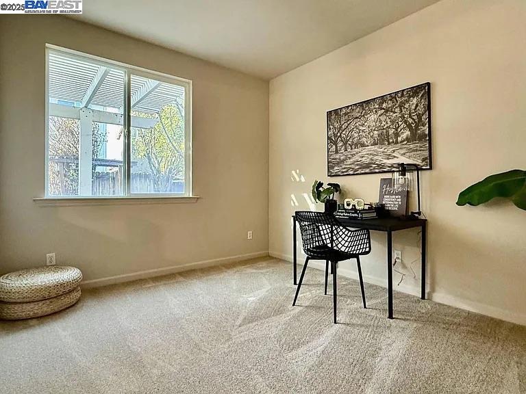 3017 Roslyn Drive Modesto, CA 95355 - Photo 9 of 30 a view of a livingroom with furniture and a window