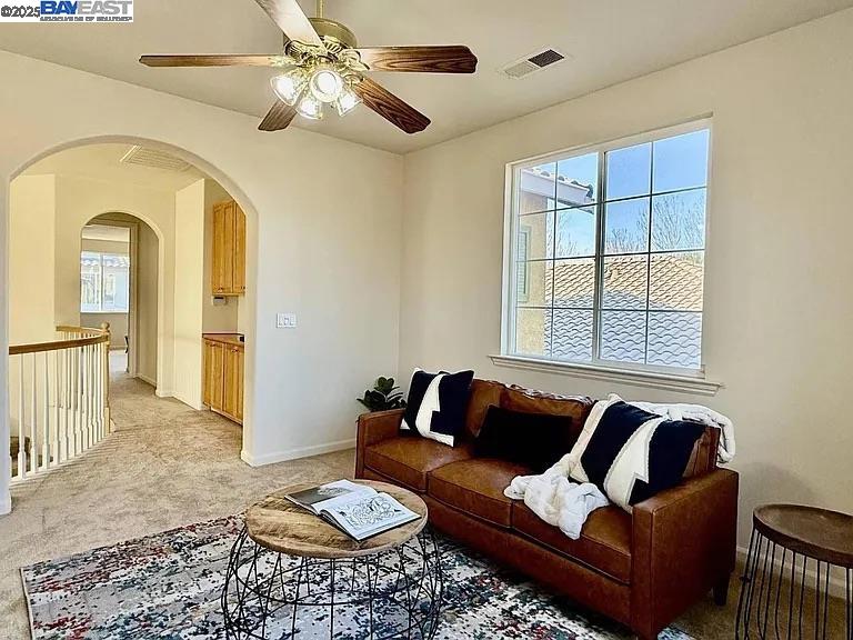 3017 Roslyn Drive Modesto, CA 95355 - Photo 10 of 30 a living room with furniture and a large window