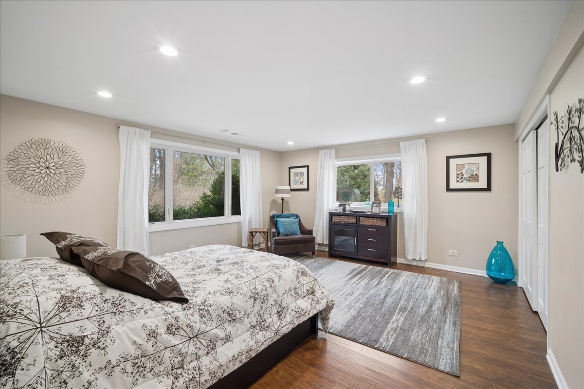 480 Highway 22 Barrington, IL 60010 - Photo 14 of 25 a bedroom with a large bed and a window