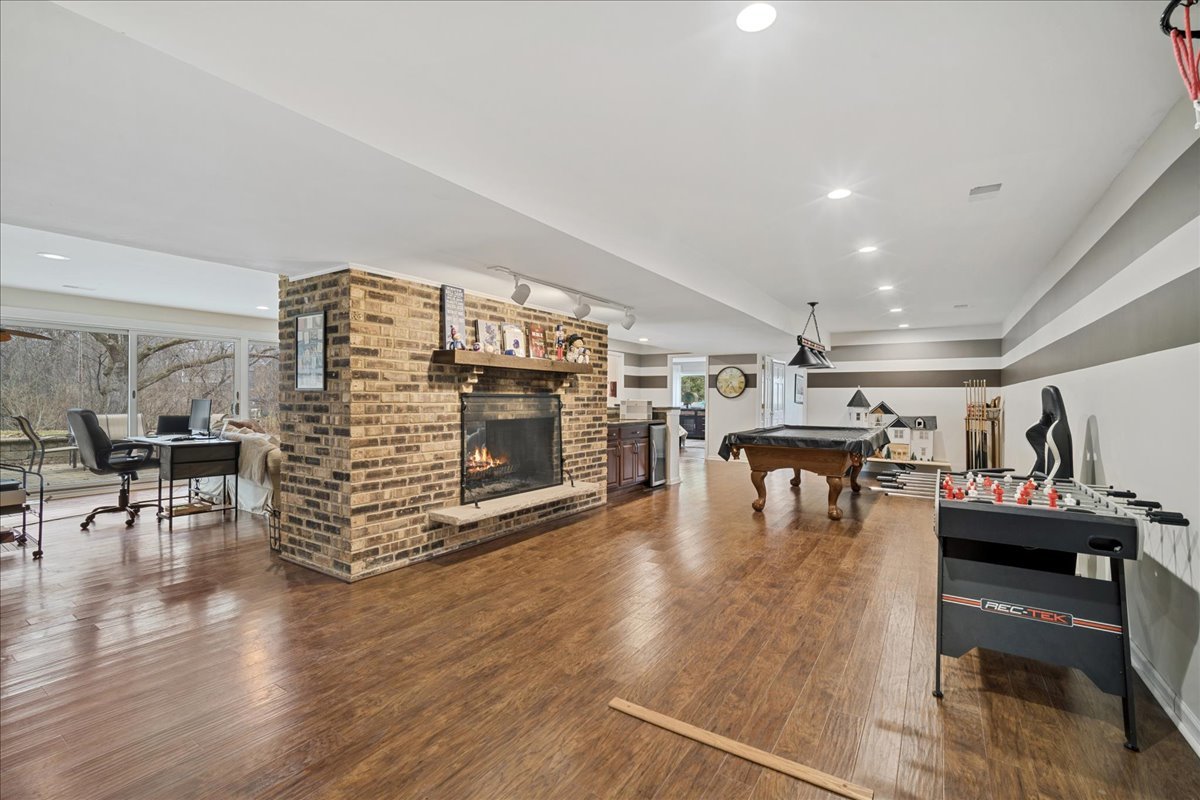 480 Highway 22 Barrington, IL 60010 - Photo 18 of 25 a living room with furniture and a fireplace