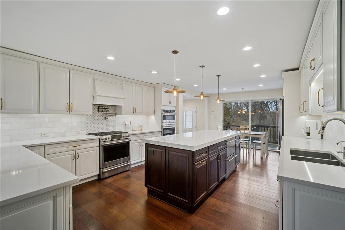 480 Highway 22 Barrington, IL 60010 - Photo 2 of 25 a kitchen with stainless steel appliances granite countertop a sink stove and cabinets