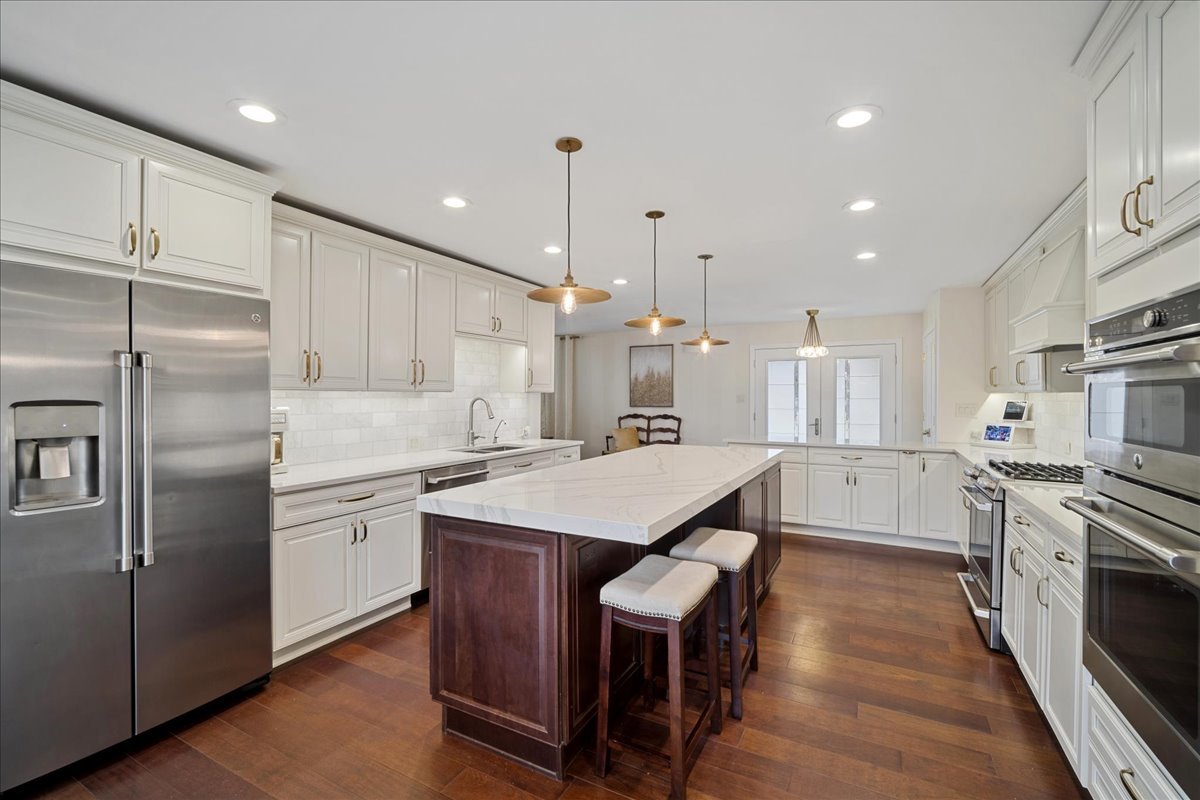 480 Highway 22 Barrington, IL 60010 - Photo 3 of 25 a kitchen with cabinets and stainless steel appliances