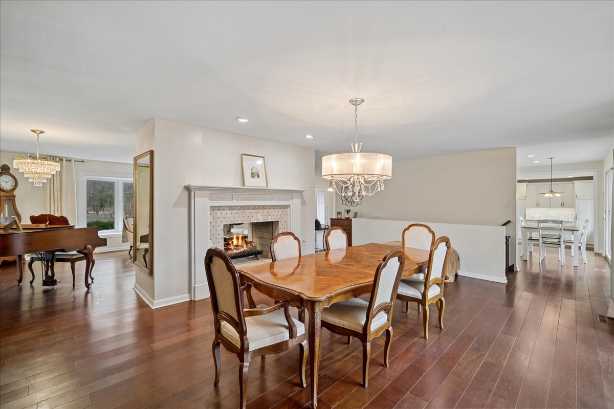 480 Highway 22 Barrington, IL 60010 - Photo 6 of 25 a view of a dining room with furniture wooden floor and chandelier