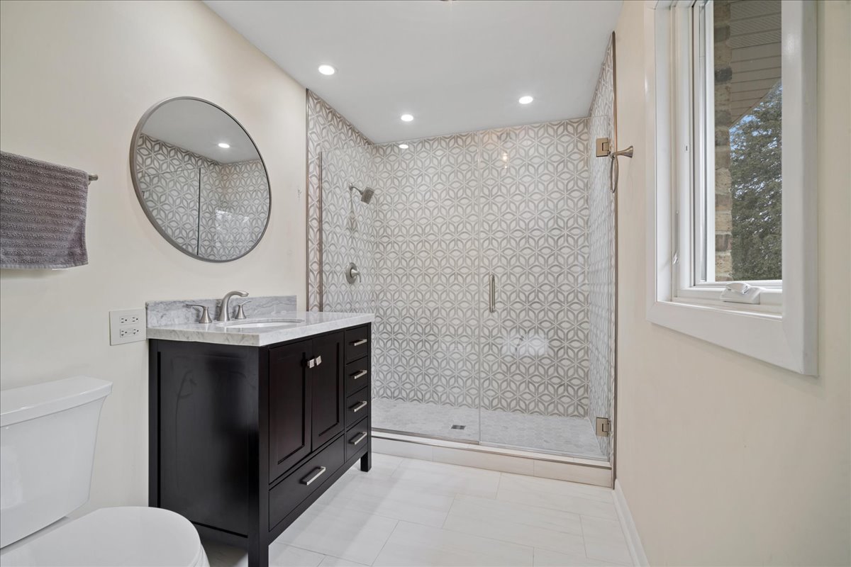 480 Highway 22 Barrington, IL 60010 - Photo 8 of 25 a bathroom with a sink a toilet and shower