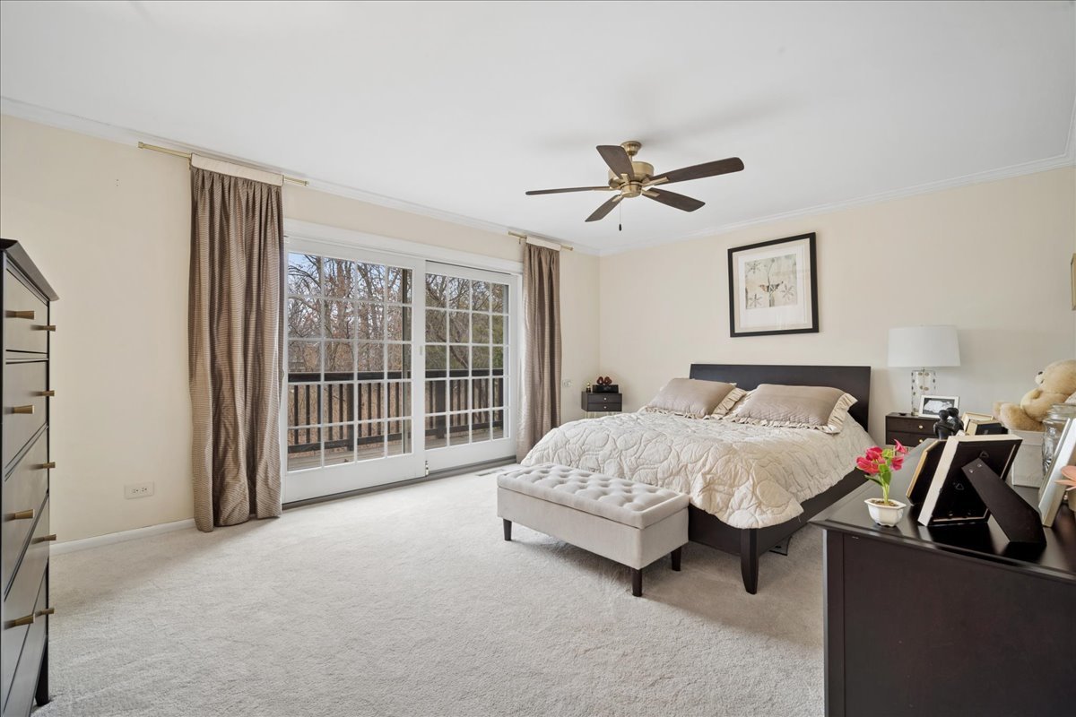 480 Highway 22 Barrington, IL 60010 - Photo 9 of 25 a spacious bedroom with a bed and a large window
