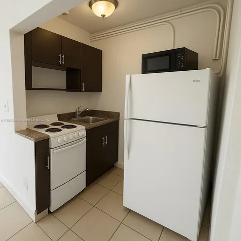 a utility room with washer and dryer