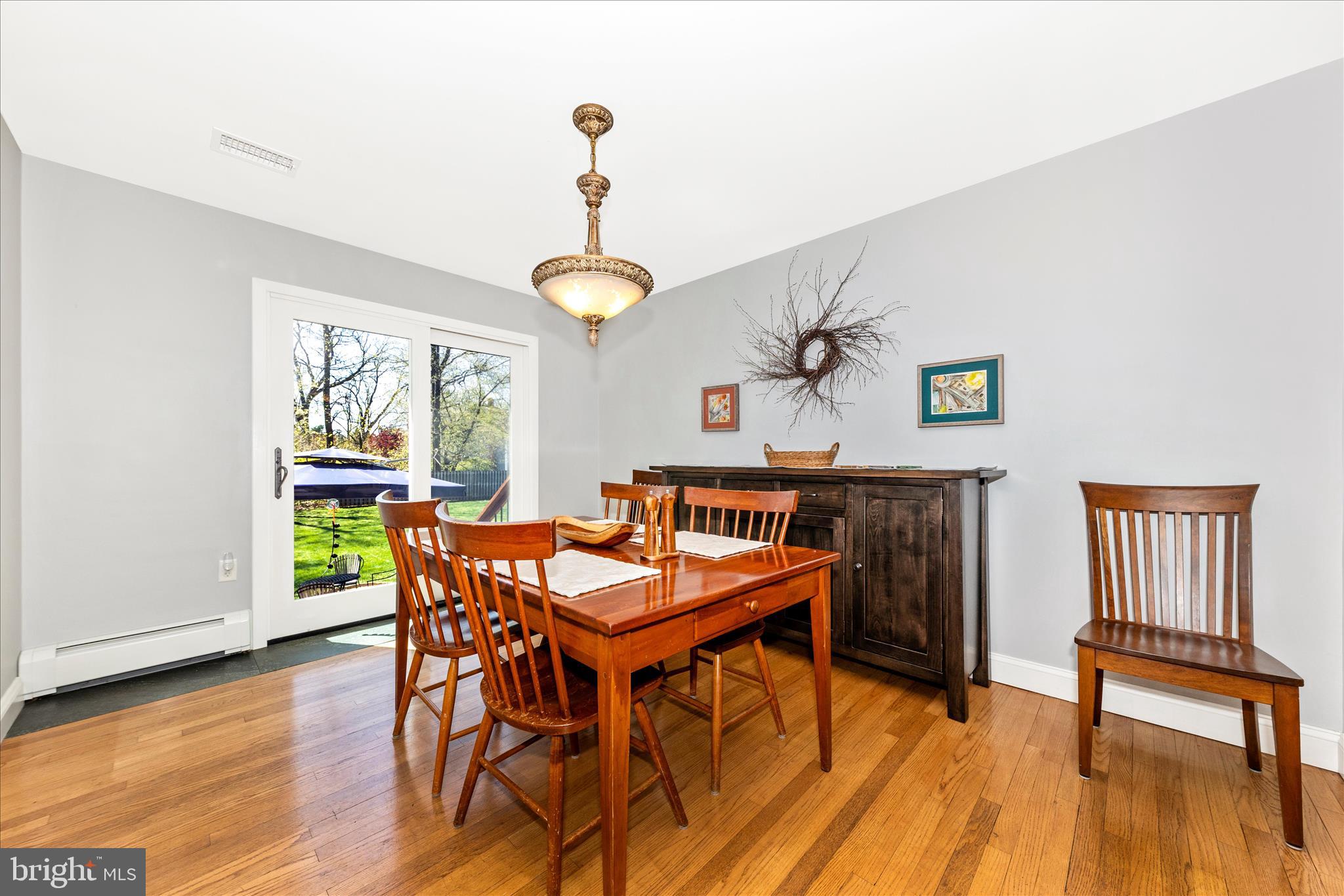 210 Oak Street Mount Airy, MD 21771 - Photo 10 of 59 Dining Room has Slider to Rear Yard