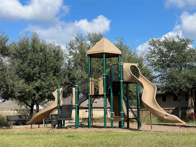 a house view with a garden space