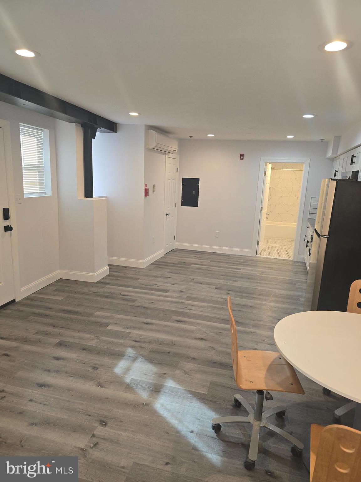 210 Shurs Lane, Unit STUDIO Philadelphia, PA 19128 - Photo 6 of 14 a view of a livingroom with furniture