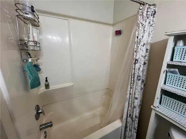 a bathroom with a bathtub