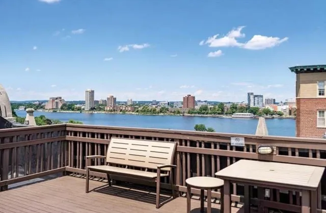 a view of a balcony with chairs