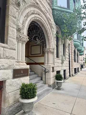 a view of a house with outdoor seating and entertaining space