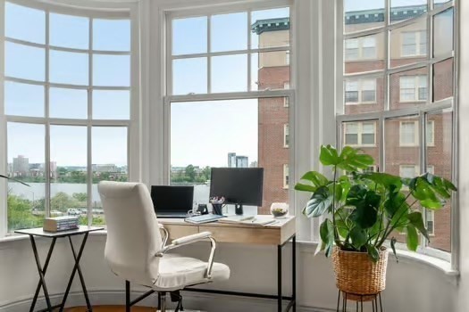 4 Charlesgate East, Unit 604 Boston, MA 02215 - Photo 6 of 20 a view of a dining room with furniture window and wooden floor