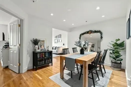 a view of a dining room with furniture