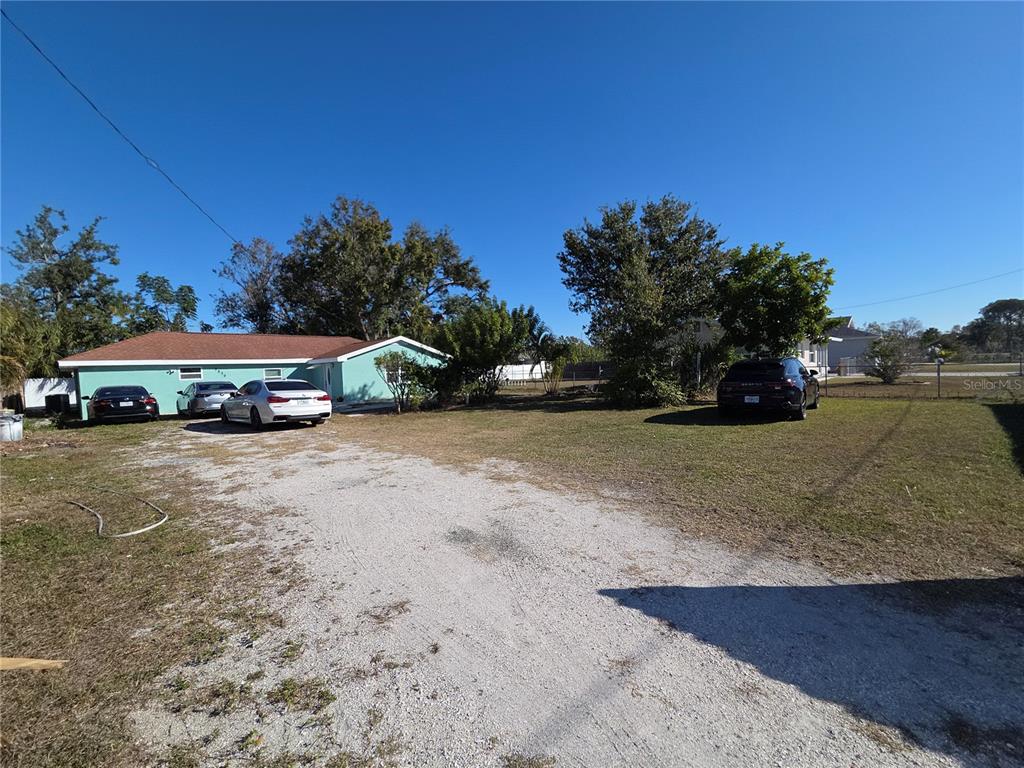 2839 Olympic Street Sarasota, FL 34231 - Photo 27 of 34 a car parked on the side of the road