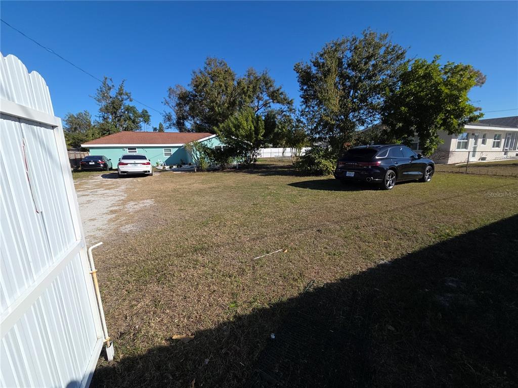 2839 Olympic Street Sarasota, FL 34231 - Photo 30 of 34 a view of a house with a yard