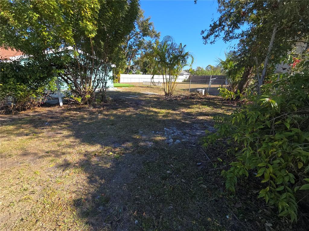 2839 Olympic Street Sarasota, FL 34231 - Photo 31 of 34 a view of dirt field with trees