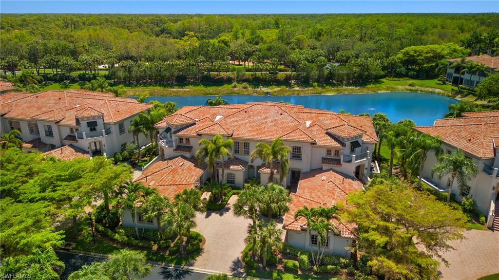17046 Porta Vecchio Way, Unit 101 Naples, FL 34110 - Photo 27 of 27 an aerial view of a house with garden space and outdoor space
