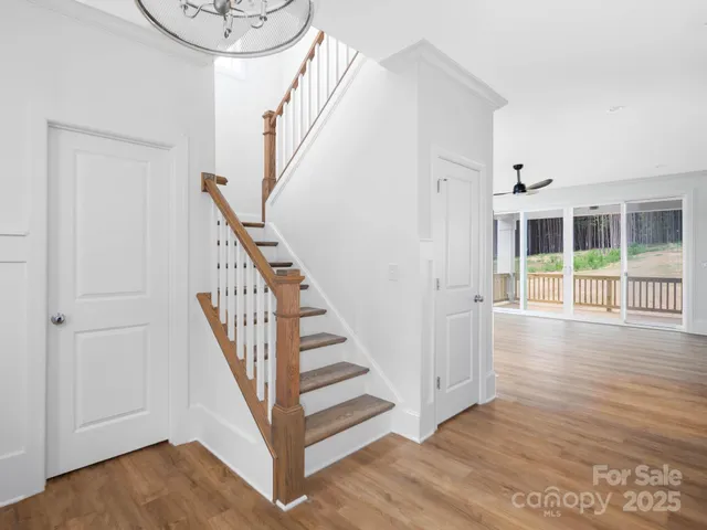 a kitchen with stainless steel appliances a sink a stove and refrigerator