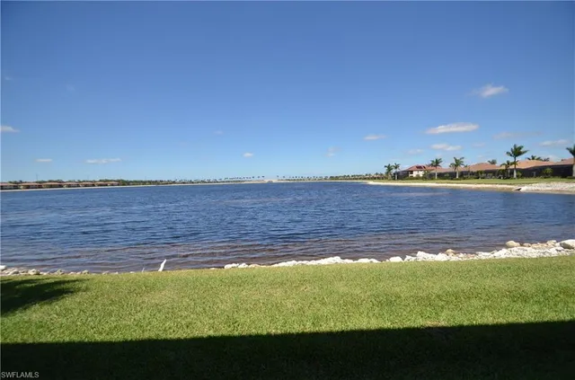 a view of a lake with a city