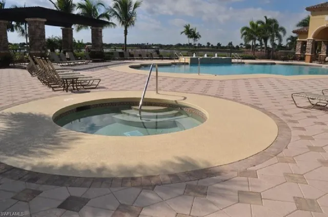 a view of a swimming pool with a lake