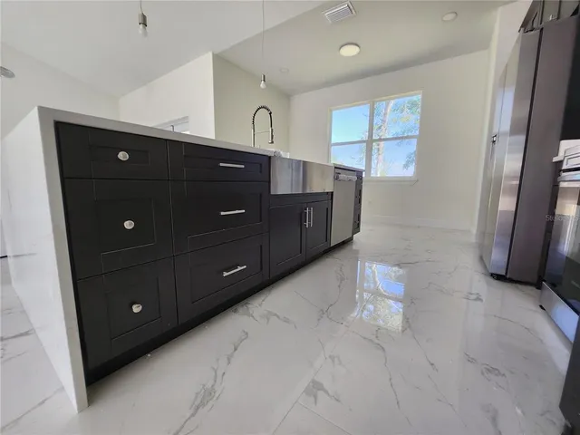 a view of livingroom with hardwood floor and a ceiling fan