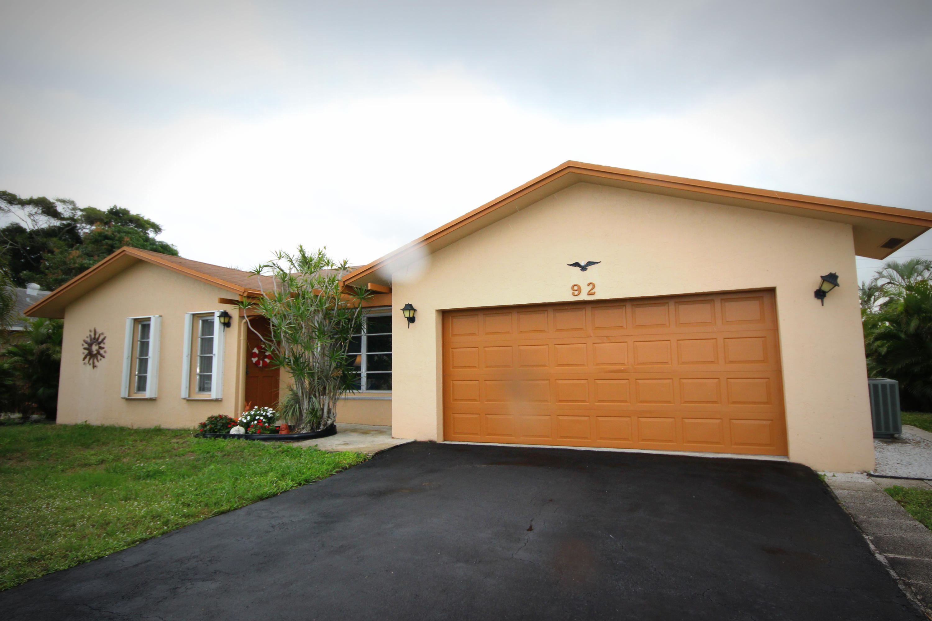 92 Laredo Lane Boca Raton, FL 33487 - Photo 1 of 20 front