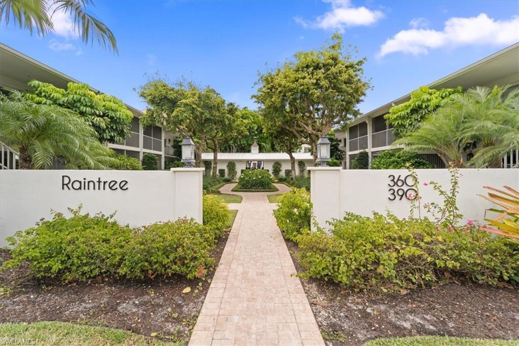 380 4th Avenue South, Unit 380 Naples, FL 34102 - Photo 11 of 19 a view of a house with a yard
