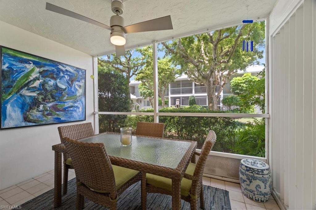 380 4th Avenue South, Unit 380 Naples, FL 34102 - Photo 19 of 19 a view of a dining room with furniture window and outside view