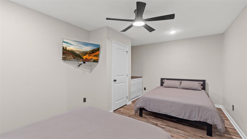 228 Old Factory Road Murfreesboro, AR 71958 - Photo 17 of 37 a bedroom with a bed and a painting on the wall